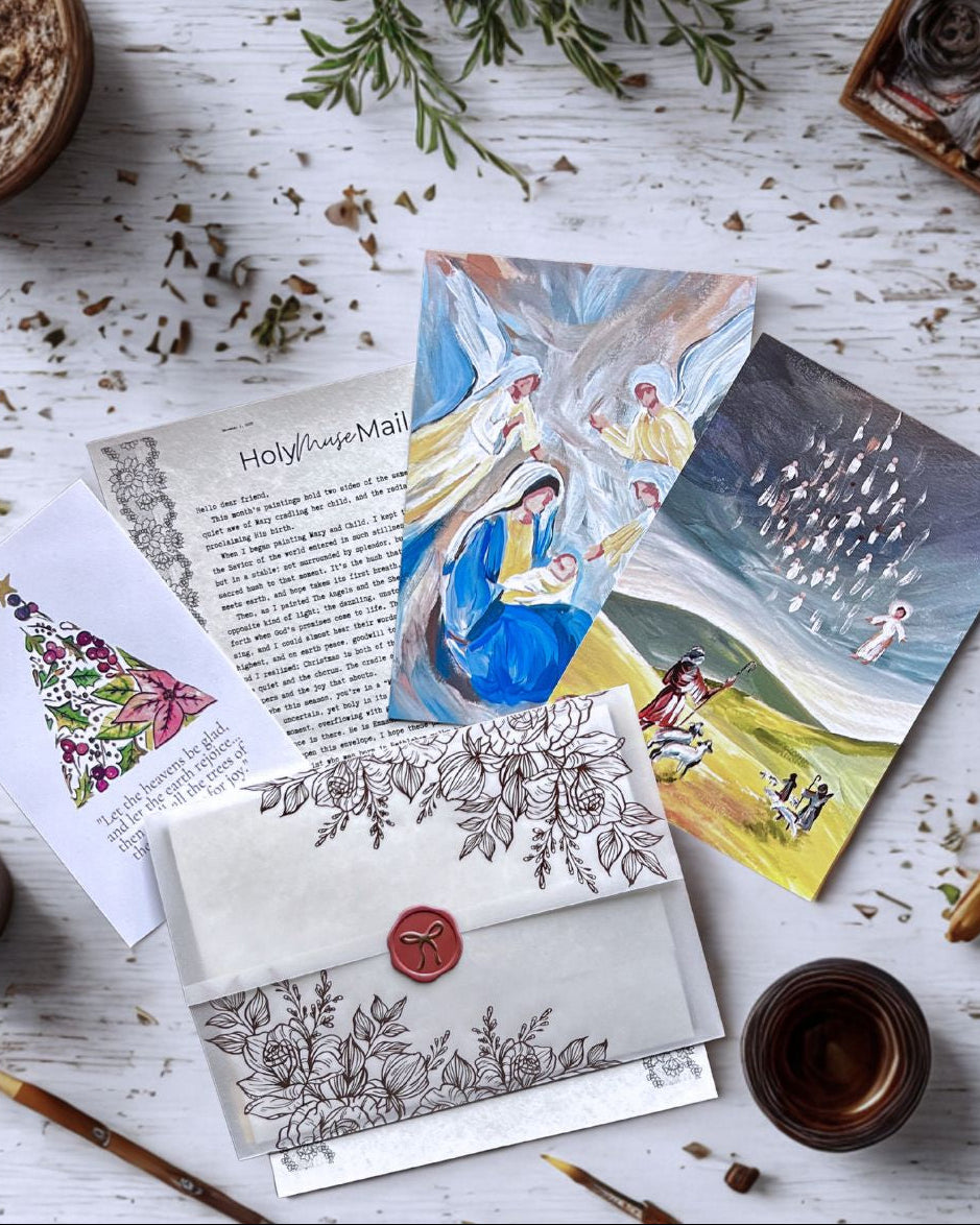 Collection of greeting cards and stationery items on a wooden surface with decorative elements.