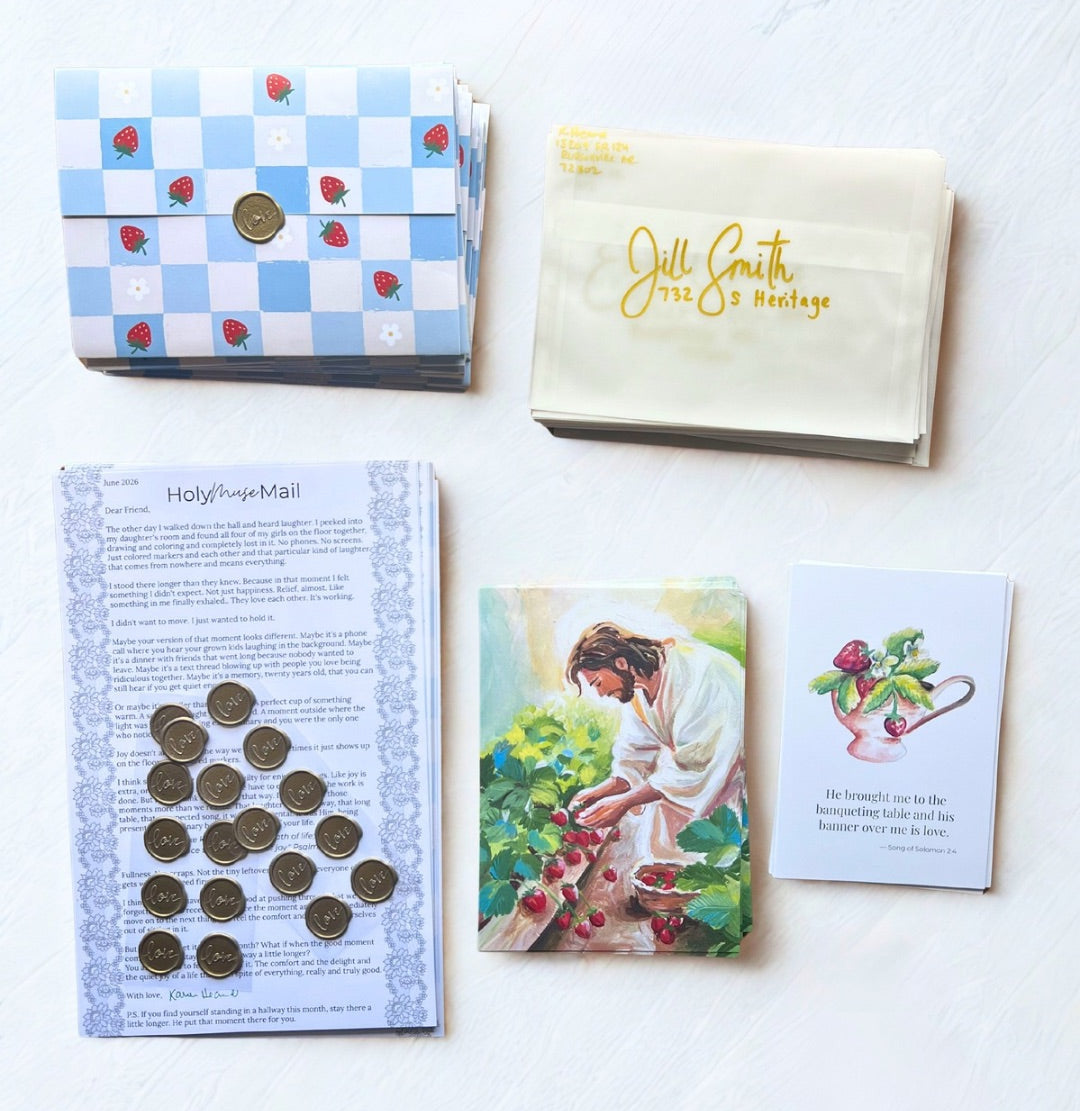 Collection of hand painted faith based art and stationery items on a white background